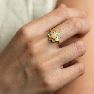 Delilah Opal gold ring worn on hand