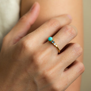Tiana Turquoise, Topaz, and Peridot on Gold ring worn by model