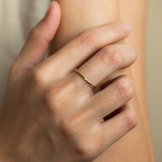 Naomi Citrine on gold ring worn by hand model