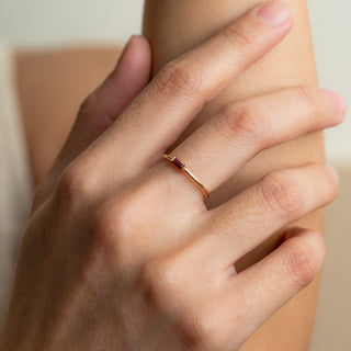 Elize Garnet on Gold ring worn by hand model