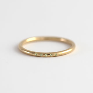 Oliana Peridot on gold ring