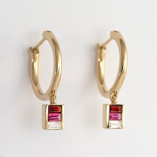 Quinn gold hoop earrings with baguette stones